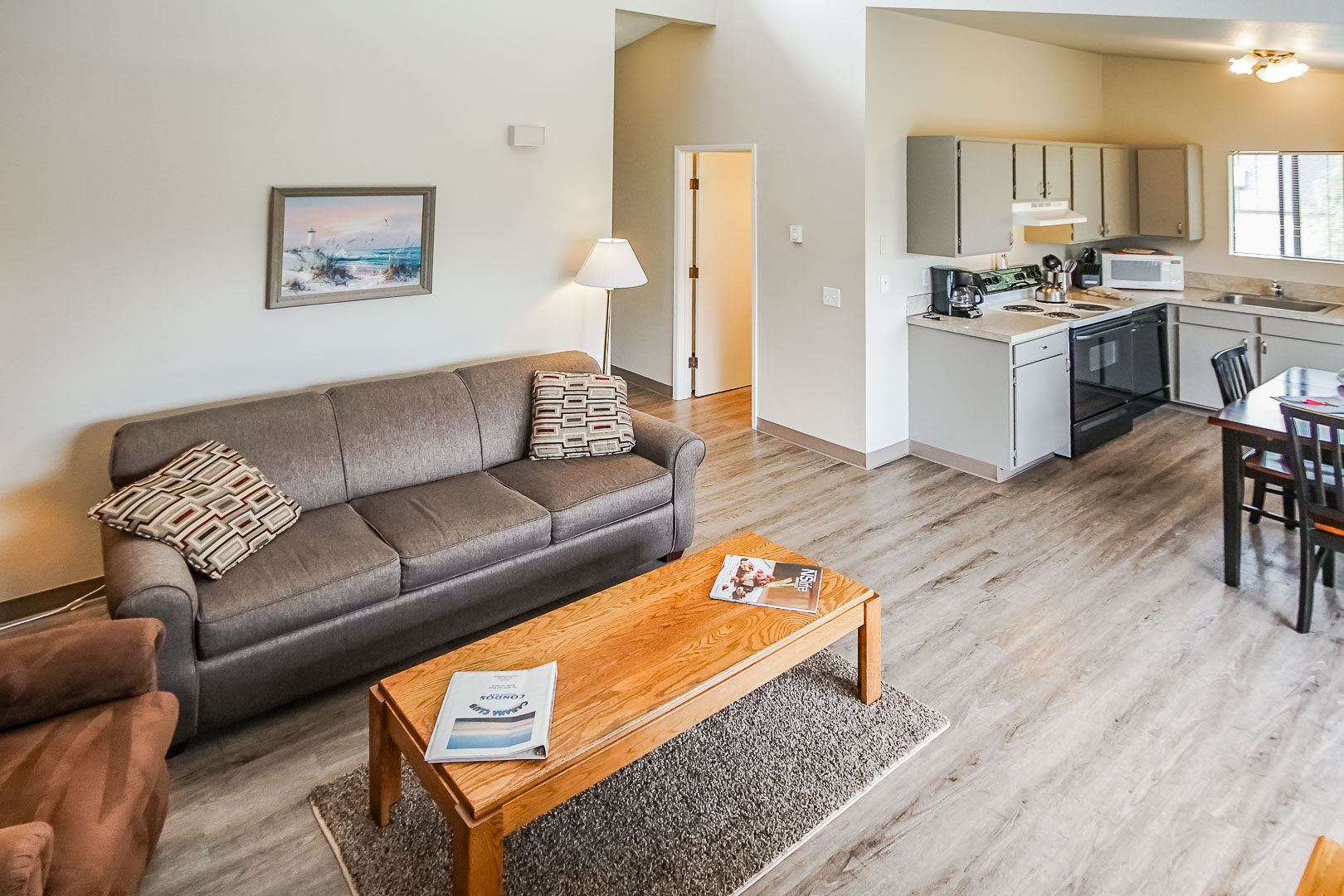 A fully renovated living room and kitchen at VRI's Cabana Club in Blaine, Washington.